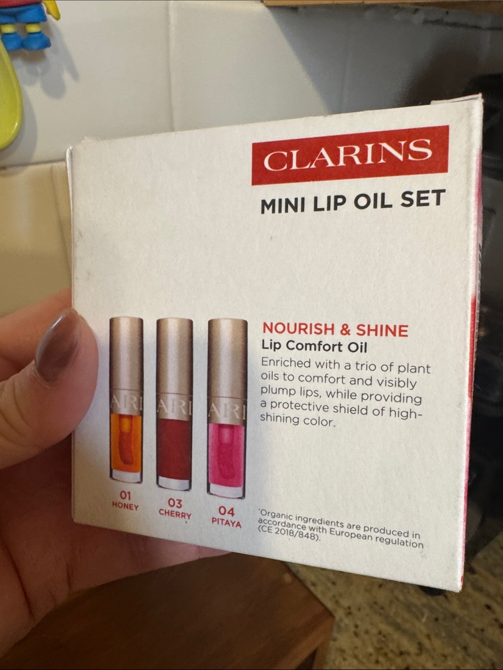 Clarins Lip Bliss Minis Lip Comfort Oil Trio - Red, Pink, Orange - Picture 9 of 10